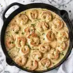 Creamy garlic shrimp served over white rice with rich garlic cream sauce