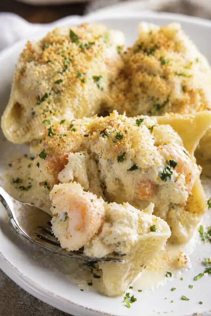 creamy seafood stuffed shells close up showing shrimp crab filling and creamy texture