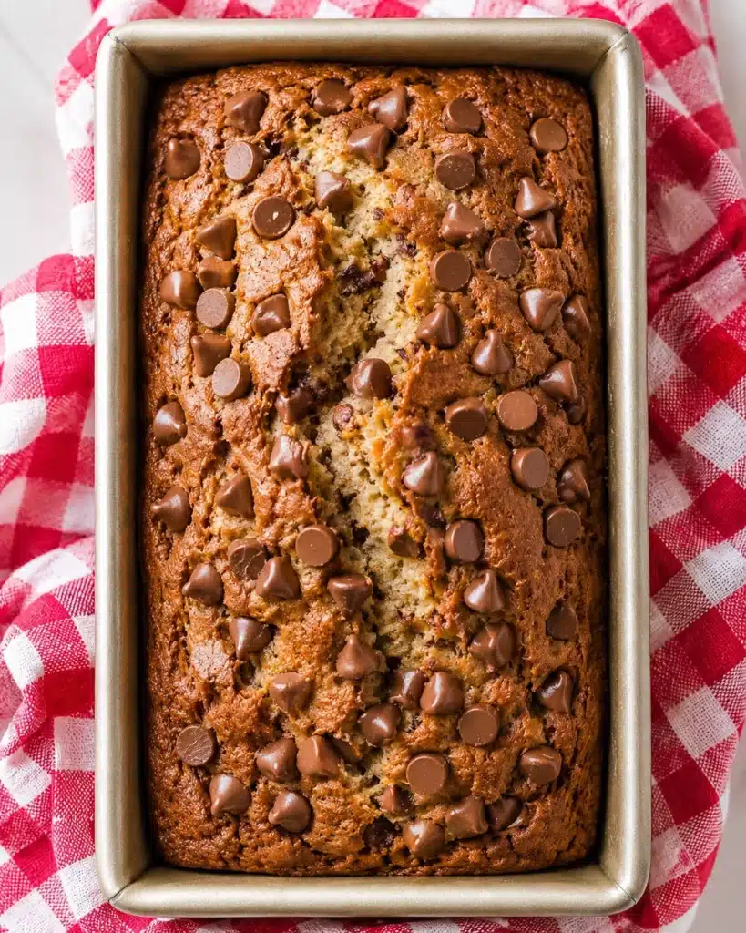 Banana bread loaf with chocolate chips baked in a rectangular pan