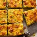 Square portions arranged neatly with a knife beside them